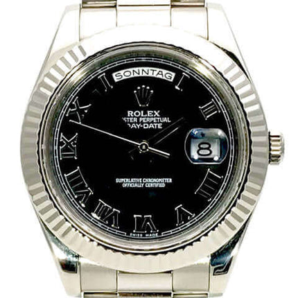 Rolex Day-Date II 18 kt Weißgold Uhr mit schwarzem Zifferblatt und Datumsanzeige.