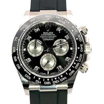 Rolex Daytona Weißgolduhr mit schwarzem Zifferblatt und schwarzem Armband, Modell 116519LN.