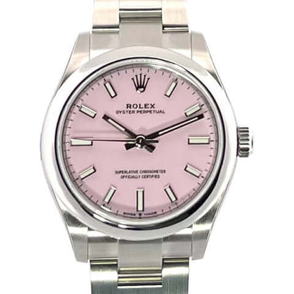 Rolex Oyster Perpetual 31 Uhr mit rosa Zifferblatt und Edelstahlarmband.