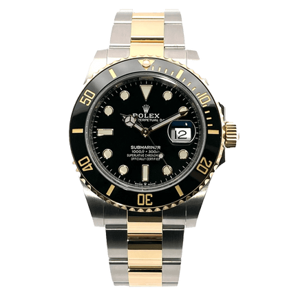 Rolex Submariner Armbanduhr mit schwarz-goldenem Zifferblatt und Edelstahlarmband, ideale Wahl für Damen und Herren.