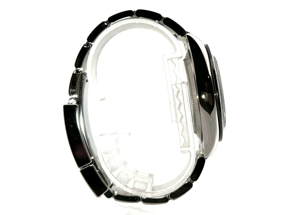 Rolex Daytona Edelstahl 116500LN Seitenansicht des Oyster-Armbands aus Edelstahl, poliert und satiniert, mit Keramik Lünette und Sicherheitsfaltschließe.