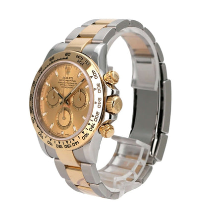 Rolex Daytona Edelstahl Gelbgold 116503 Champagner auf einem silber-goldenen Armband, champagnerfarbenes Zifferblatt