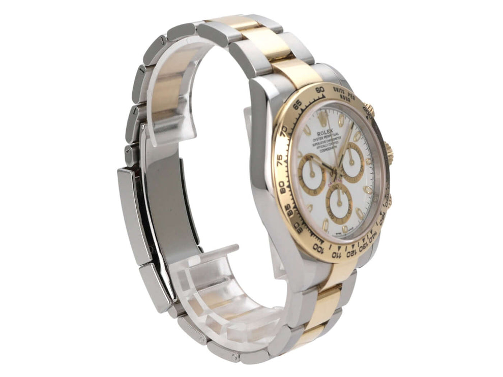 Rolex Daytona Edelstahl Gelbgold 116503 Weiss seitlich mit glänzendem Gehäuse und goldener Lünette.