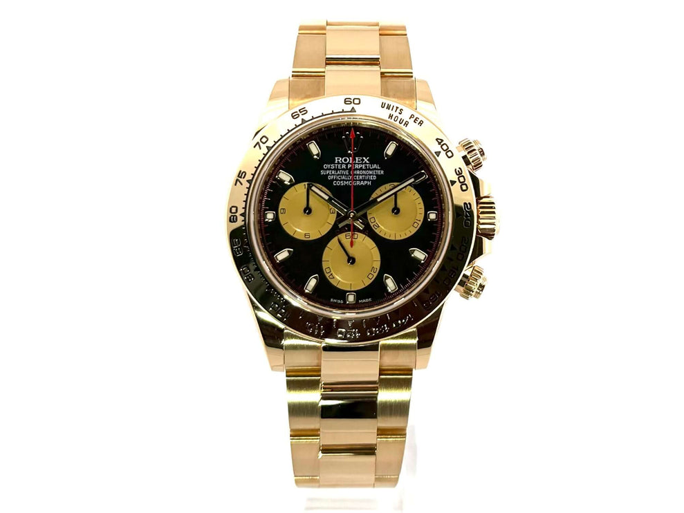 Rolex Cosmograph Daytona 116508 in 18 kt Gelbgold mit schwarzem Zifferblatt und champagnerfarbenen Totalisatoren, Tachymeterlünette und Oyster-Armband.