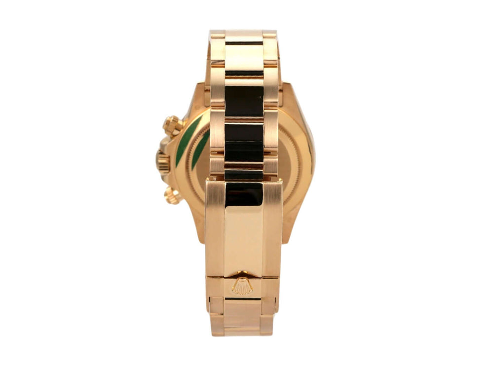 Rolex Cosmograph Daytona 18 kt Gelbgold 116508 Weiß von der Seite mit 18 kt Gelbgold Armband und Faltschließe.