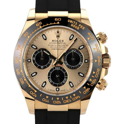 Rolex Daytona 116518LN Gelbgold Oysterflex Champagnerfarben mit schwarzem Oysterflex-Band und Champagnerfarbenem Zifferblatt.