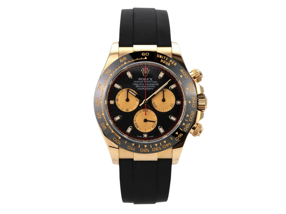 Rolex Daytona 116518LN Gelbgold Oysterflex Schwarz Champagner mit schwarzem Zifferblatt und champagnerfarbenen Totalisatoren.