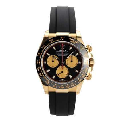 Rolex Daytona 116518LN in Gelbgold mit schwarzem Oysterflex-Band und Champagnerfarbene Totalisatoren.