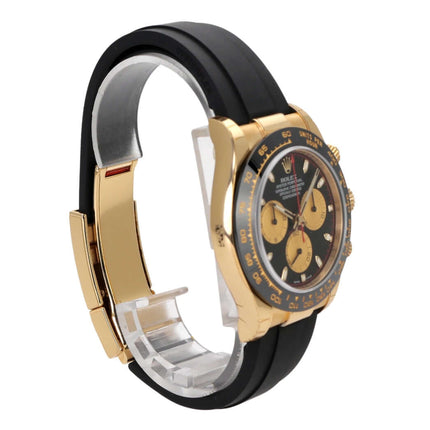 Rolex Daytona 116518LN Gelbgold mit schwarzem Oysterflex-Band, schwarzem Zifferblatt und Champagner-Totaliatoren.