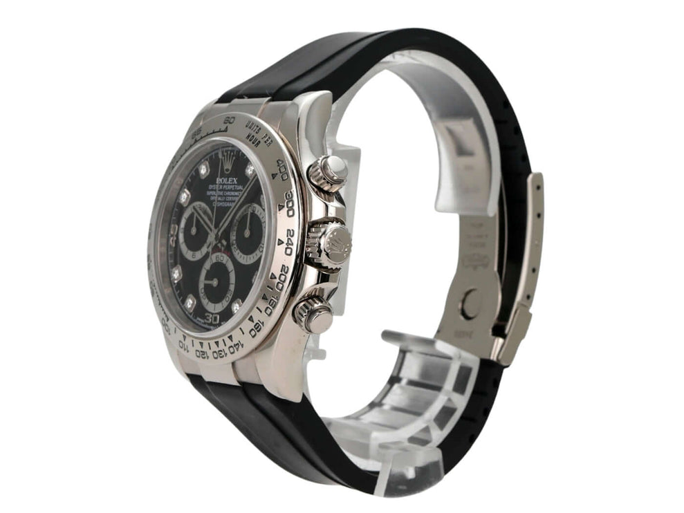 Rolex Daytona 116519 Weißgold Schwarz Diamant seitliche Ansicht mit schwarzem Kautschukband und poliertem Gehäuse.