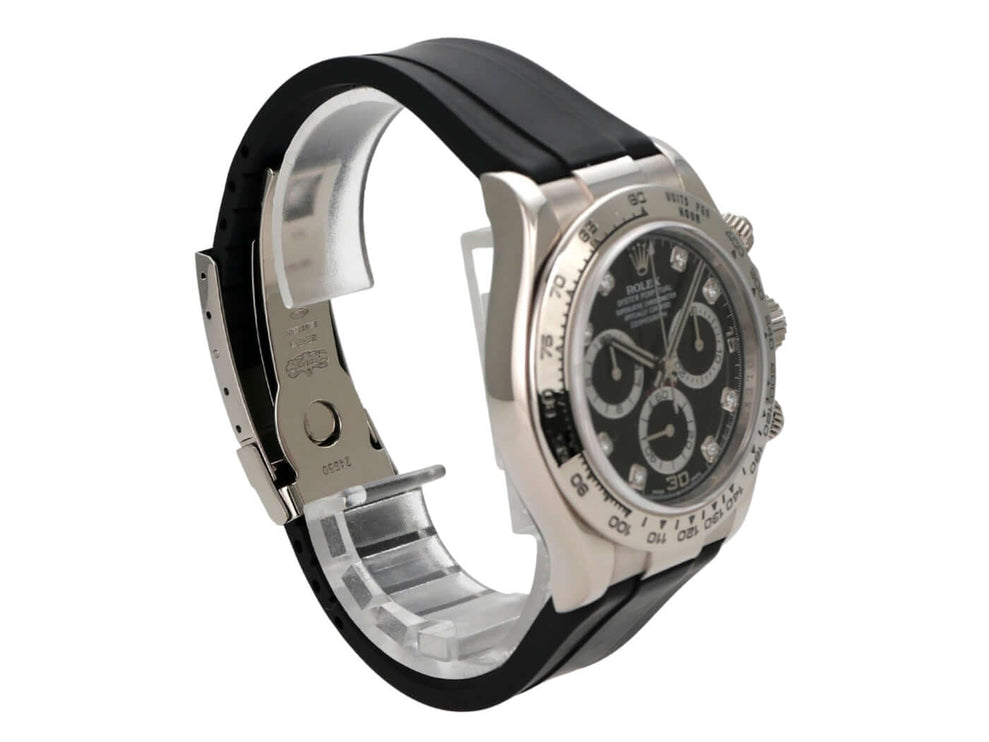 Rolex Daytona 116519 Weißgold Schwarz Diamant mit schwarzem Kautschukband und poliertem Gehäuse.