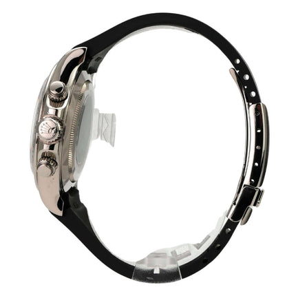 Rolex Daytona 116519 Weißgold Schwarz Diamant seitliche Ansicht mit schwarzem Kautschukband und edlem Gehäuse.