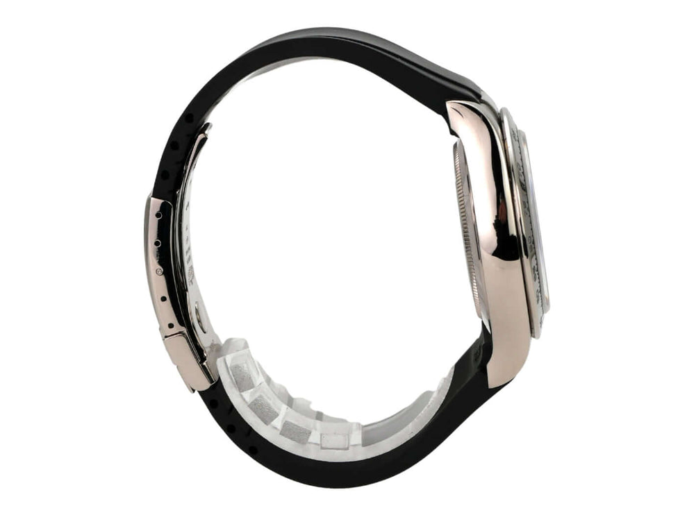 Rolex Daytona 116519 Weißgold Schwarz Diamant seitliche Ansicht mit schwarzem Kautschukband und 18 kt Weißgold Gehäuse.