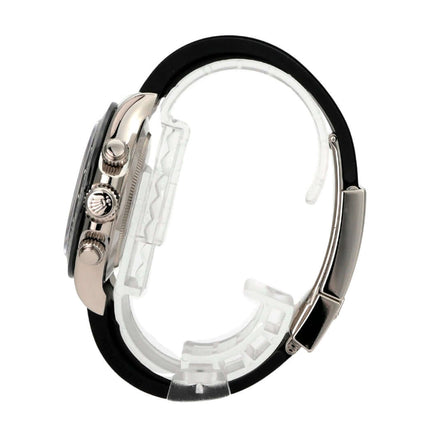 Seitenansicht der Rolex Daytona 116519LN Weißgold Oysterflex Grau mit schwarzem Band und Keramikkappe.