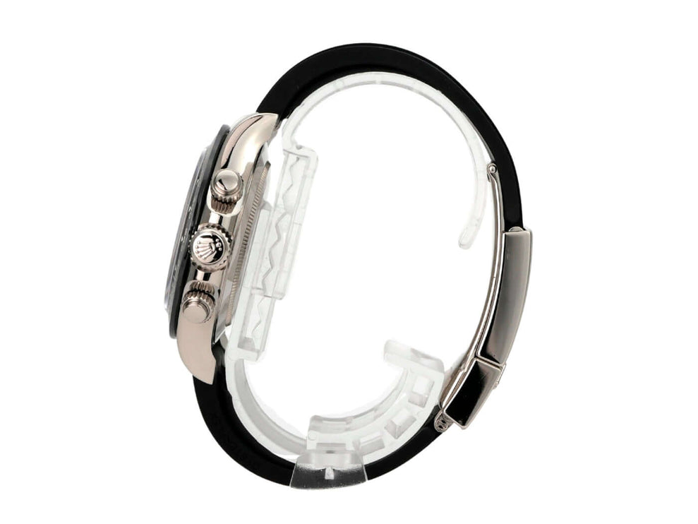 Seitenansicht der Rolex Daytona 116519LN Weißgold Oysterflex Grau mit schwarzem Band und Keramikkappe.