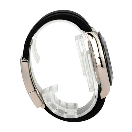 Rolex Daytona 116519LN Weißgold Oysterflex Grau seitliche Ansicht mit schwarzem Band und poliertem Gehäuse.