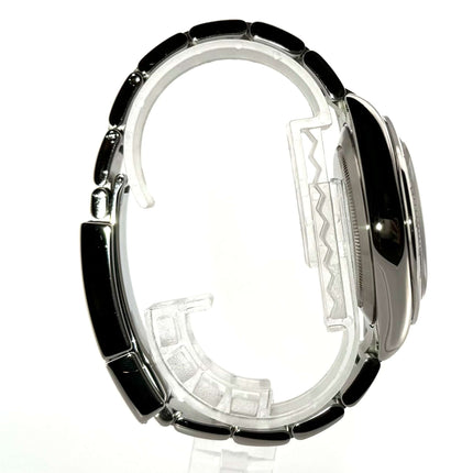 Seitenansicht Rolex Daytona Edelstahl 116520 mit Oyster Armband und Sicherheitsfaltschließe, poliert und satiniert, weißes Zifferblatt