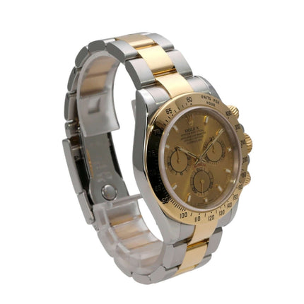 Rolex Daytona Edelstahl Gelbgold 116523 Champagner - Blick auf die Lünette mit Tachymeterskala.
