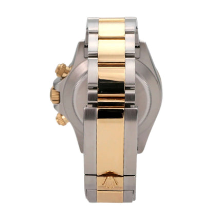 Detailansicht des Rolex Daytona 116523 Armbands aus Edelstahl und Gelbgold.