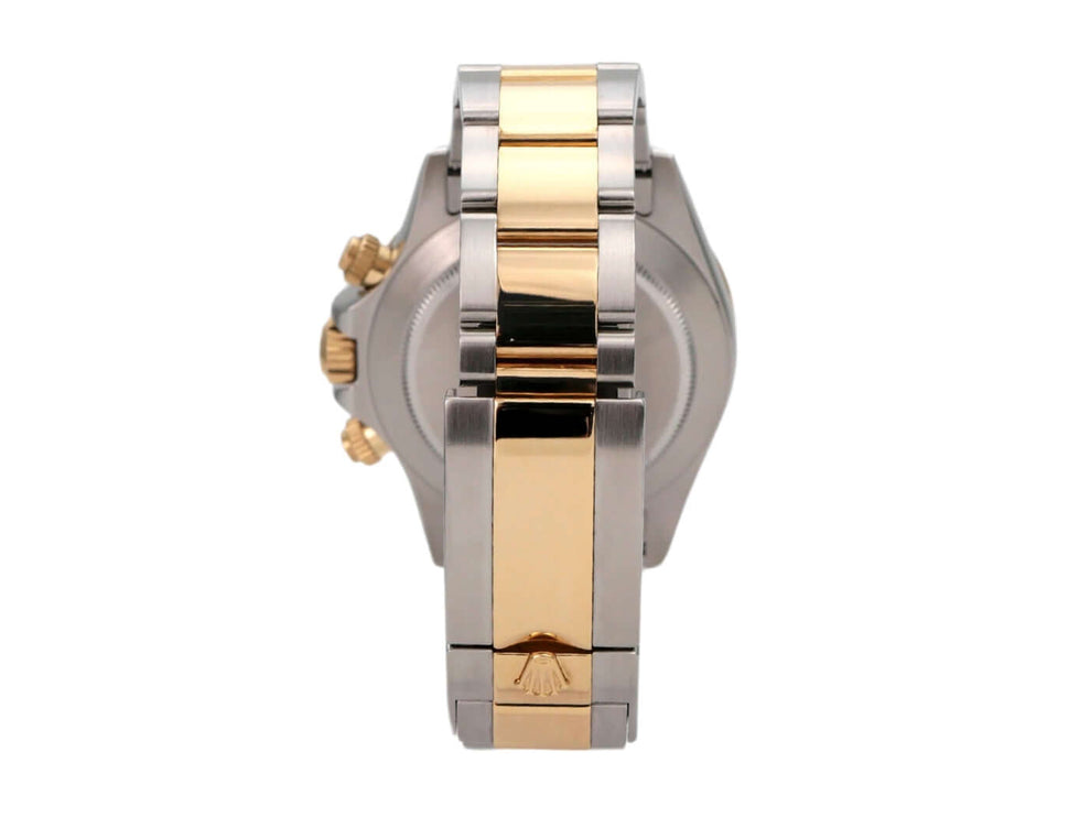 Detailansicht des Rolex Daytona 116523 Armbands aus Edelstahl und Gelbgold.