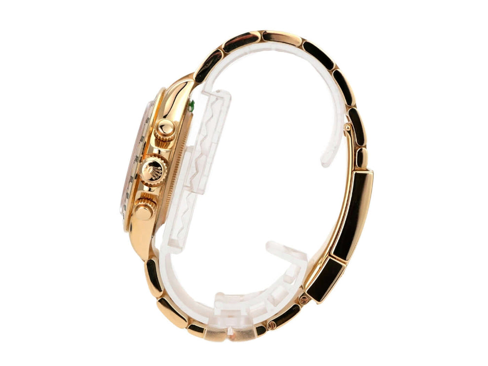 Rolex Cosmograph Daytona 116528 Gelbgold Gold Crystal Diamant seitliche Ansicht der Uhr mit schwarzem und goldfarbenem Armband.