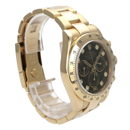Rolex Cosmograph Daytona 116528 Gelbgold Schwarz Diamant Armbanduhr mit schwarzem Zifferblatt und Diamanten.