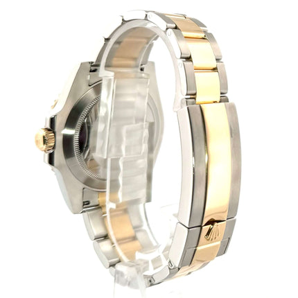 Rückseite der Rolex Submariner Date 116613LB Edelstahl-Gelbgold Armbanduhr, Ausgestattet mit Oyster Armband, Sicherheitsfaltschließe, 18 Karat Gelbgold und Edelstahl.