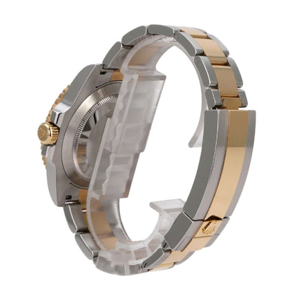 Rolex Submariner Date 116613LB Edelstahl Gelbgold seitliche Ansicht mit Edelstahl- und Gelbgoldarmband