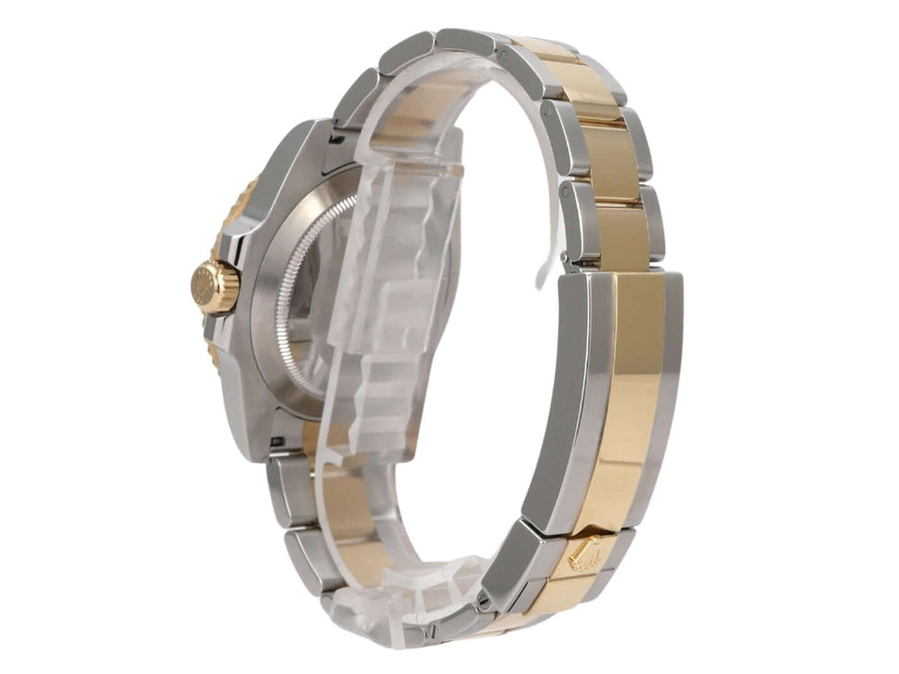 Rolex Submariner Date 116613LB Edelstahl Gelbgold, Seitenansicht mit Oyster-Armband und blauem Zifferblatt