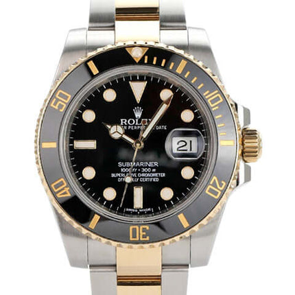 Rolex Submariner Date 116613LN aus Edelstahl und Gelbgold mit schwarzem Zifferblatt und drehbarer Lünette.