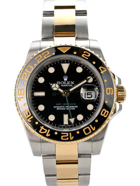 Rolex GMT-Master II 116713LN mit schwarzem Zifferblatt und goldener Lünette, Edelstahl- und Goldarmband.