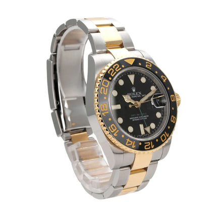 Rolex GMT-Master II 116713LN, Edelstahl und 18 kt Gelbgold, schwarzes Zifferblatt, drehbare Lünette, luxuriöse Uhr.