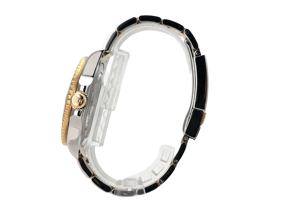 Rolex GMT-Master II 116713LN seitliche Ansicht des Armbands mit schwarzer Keramik und 18 kt Gelbgold.