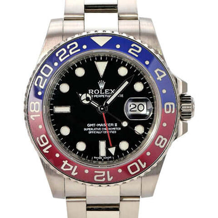 Rolex GMT Master II Weißgold 116719BLRO mit schwarzem Zifferblatt und blau-roter Lünette.