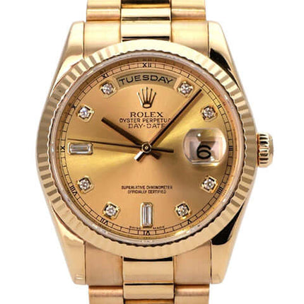 Rolex Day-Date 36 Gelbgold 118238 Champagner Diamant Uhr mit champagnerfarbenem Zifferblatt und Diamanten.