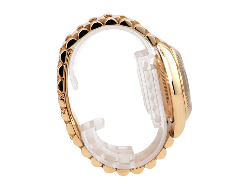 Rolex Day-Date 36 Gelbgold 118238 Champagner Diamant, Ansicht von der Seite mit Präsident-Armband aus 18 kt Gelbgold.