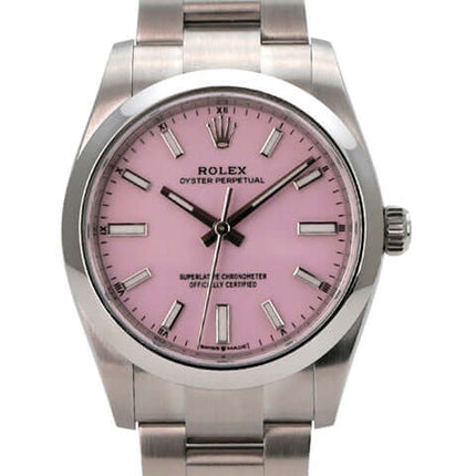 Rolex Oyster Perpetual 34 mm 124200 Candy Pink mit pinkfarbenem Zifferblatt und Edelstahl Armband.