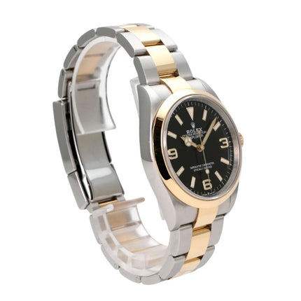 Rolex Explorer 36 Edelstahl Gelbgold 124273, schwarze Zifferblattansicht mit Edelstahl-Gelbgold-Armband