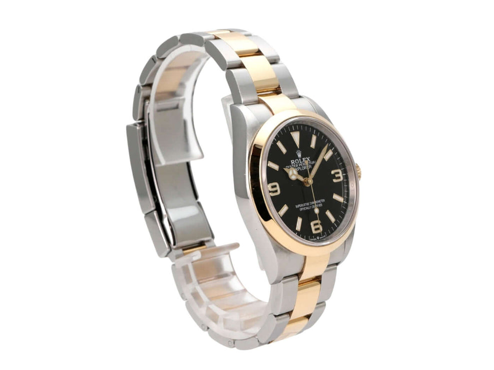 Rolex Explorer 36 Edelstahl Gelbgold 124273, schwarze Zifferblattansicht mit Edelstahl-Gelbgold-Armband