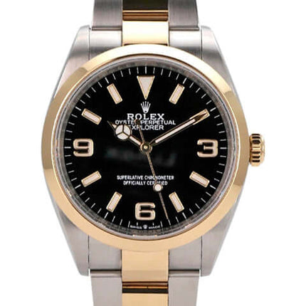 Rolex Explorer 36 Edelstahl Gelbgold 124273 mit schwarzem Zifferblatt und automatischem Uhrwerk.