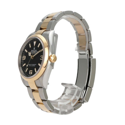 Rolex Explorer 36 Edelstahl Gelbgold 124273, schwarzes Zifferblatt, 18 kt Gelbgold Lünette, poliertes Armband