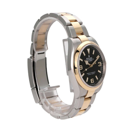 Rolex Explorer 36 Edelstahl Gelbgold Ref. 124273 mit schwarzem Zifferblatt und Leuchtzeigern.