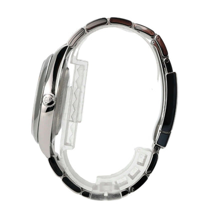 Seitenansicht der Rolex Oyster Perpetual 41 Ref. 124300 Grün mit Edelstahlband und Gehäuse.