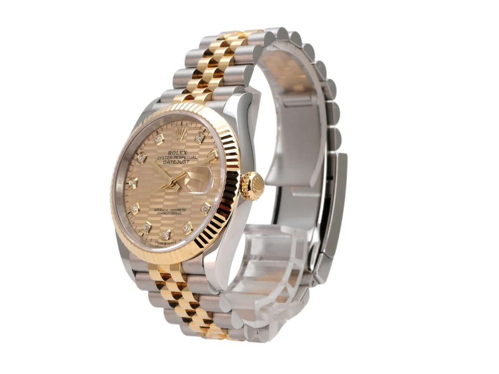 Rolex Datejust 36 Uhr Ref. 126233 mit goldenem Zifferblatt und Jubilé Armband aus Edelstahl und 18 kt Gelbgold.