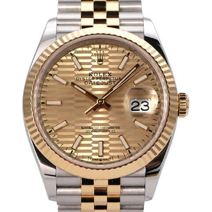 Rolex Datejust 36 Oystersteel Gelbgold 126233 Golden Riffel Jubile-Band mit goldenem Riffelmuster Zifferblatt.