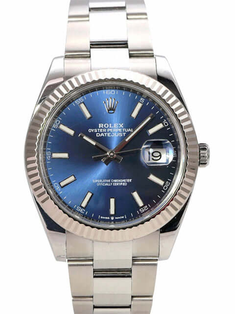 Rolex Datejust 41 Edelstahl Weißgold 126334 Blau mit poliertem Gehäuse und blauem Zifferblatt.