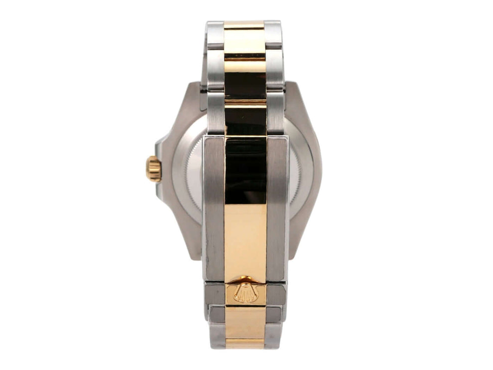 Rolex Submariner Date 41 Edelstahl Gelbgold 126613LB Ansicht von der Seite mit gold-silbernem Armband