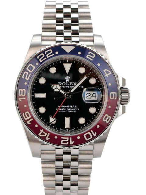 Rolex GMT-Master II Edelstahl 126710BLRO - Nahaufnahme des polierten und satinierten Edelstahlgehäuses mit blau-roter Keramikeinlage.