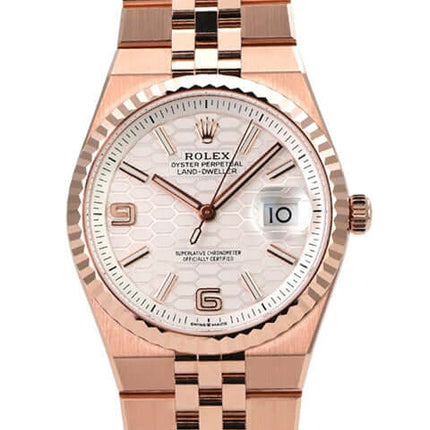 Rolex Land-Dweller 36 Everose-Gold 127235 Tiefweiß Wabe Flat Jubile-Band auf poliertem Band.