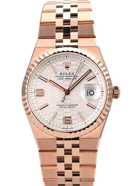 Rolex Land-Dweller 36 Everose-Gold 127235 Tiefweiß Wabe Flat Jubile-Band auf poliertem Band.